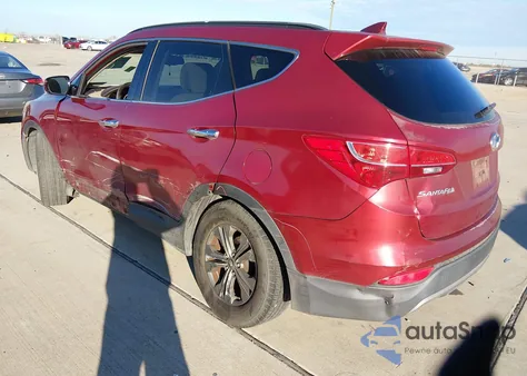 2014 Hyundai Santa Fe Sport 2.4L z USA, uszkodzony, nr VIN 5XYZUDLB6EG215531
